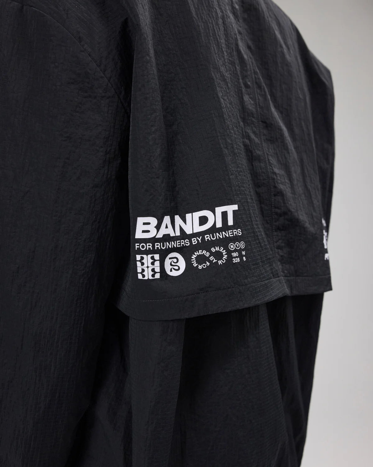 Bandit Unisex Tettura™ Footy-Run Shell Pullover