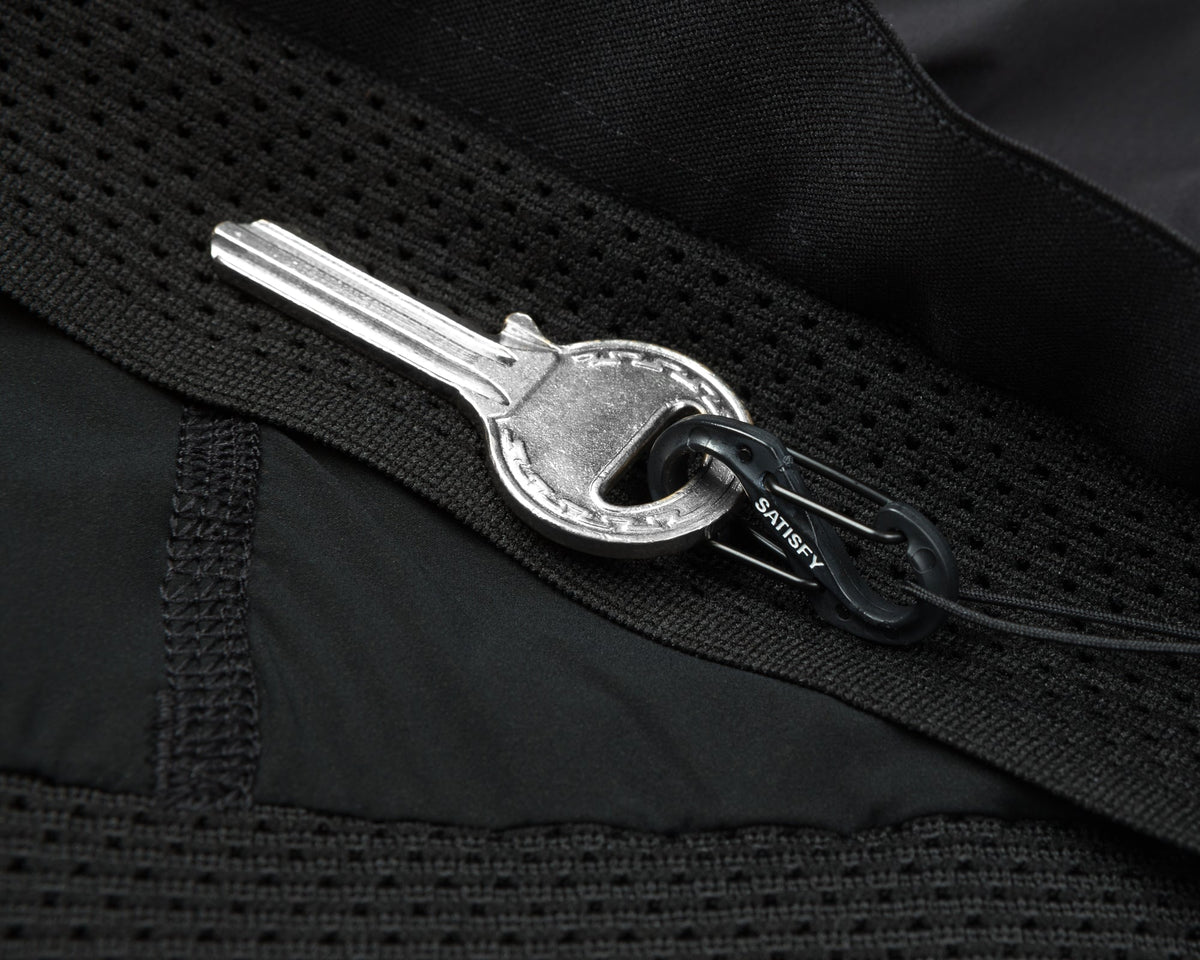 Satisfy TechSilk 8 inch running shorts in Black, key carabiner