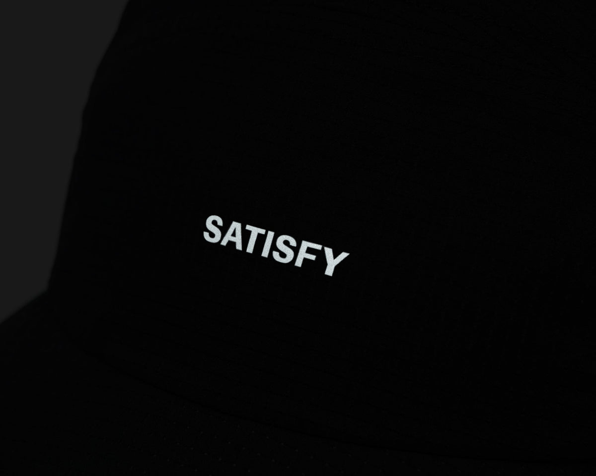 Satisfy Rippy Air Trail Cap in Black, reflective front logo