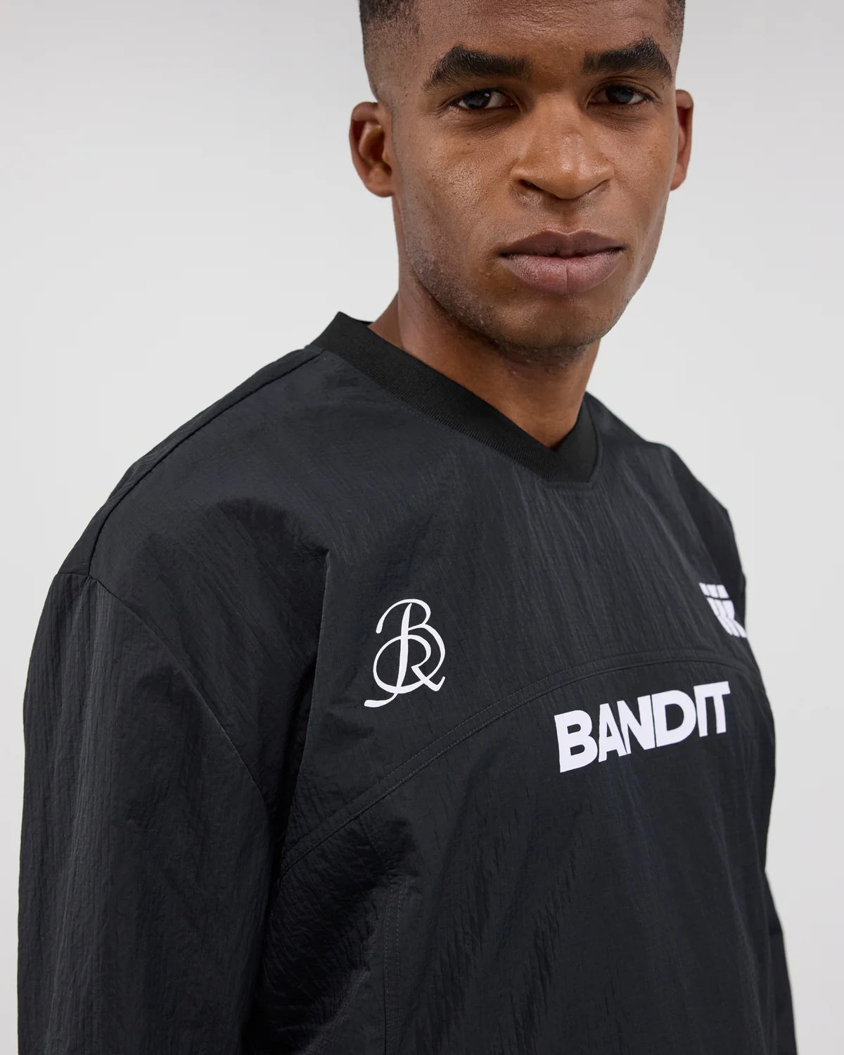 Bandit Unisex Tettura™ Footy-Run Shell Pullover