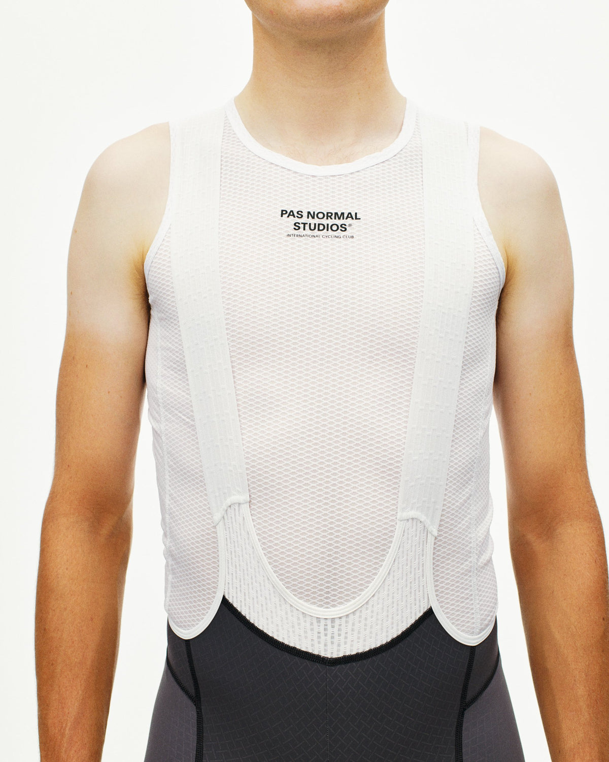 Pas Normal Studios Men's Sleeveless Base Layer in White, worn